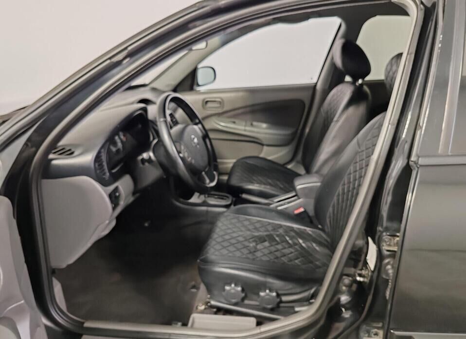 Nissan Almera Classic 1.6 AT (107 л.с.)