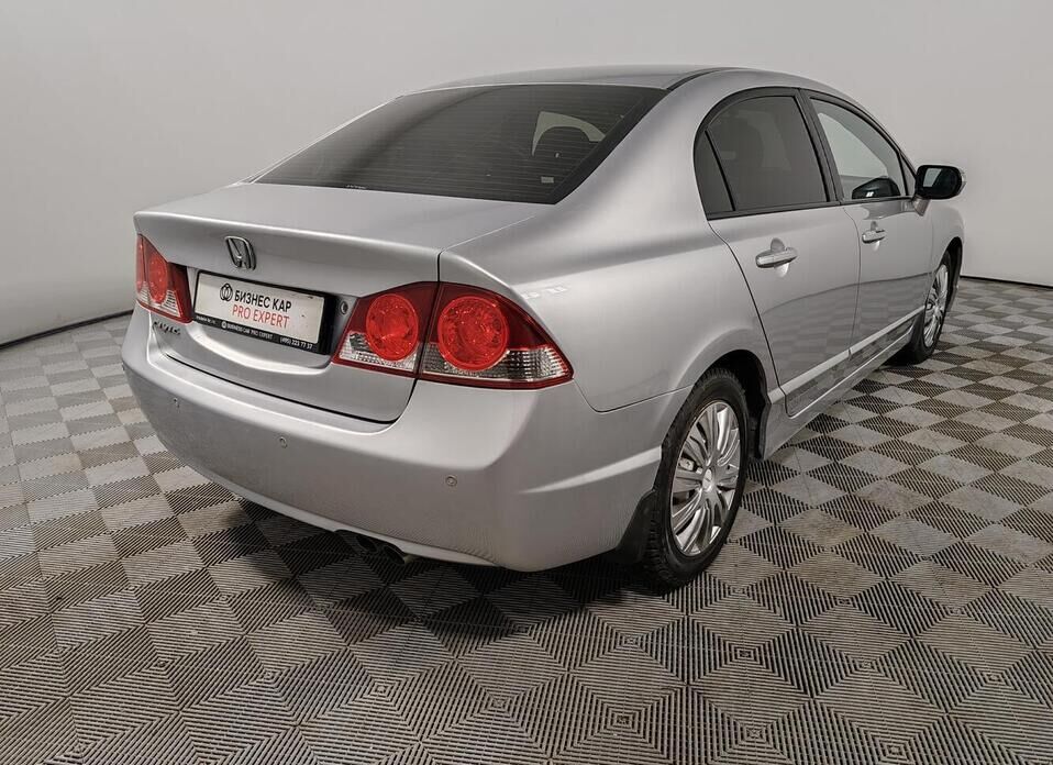 Honda Civic, VIII 1.8 AT (140 л.с.)