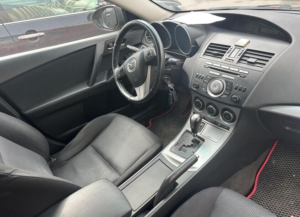 Mazda 3 1.6 AT (105 л.с.)