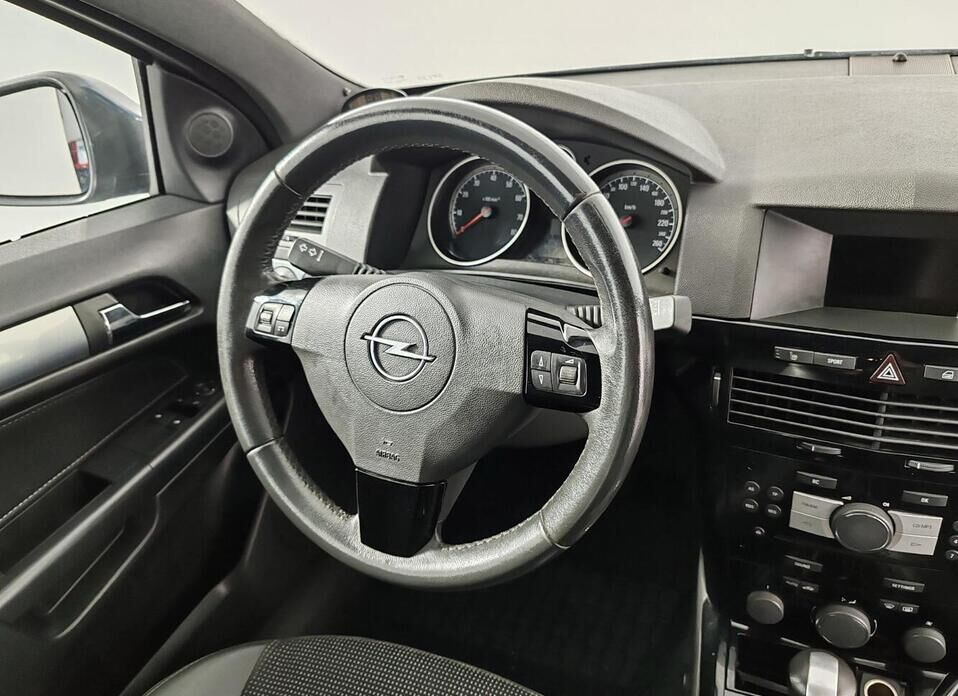 Opel Astra 1.8 AT (140 л.с.)
