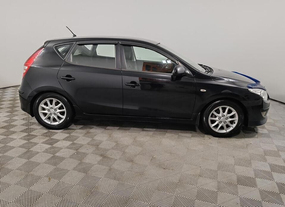 Hyundai i30, I Рестайлинг 1.6 AT (126 л.с.)