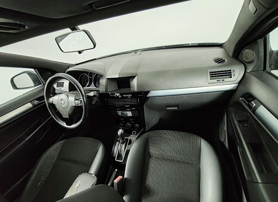 Opel Astra 1.8 AT (140 л.с.)