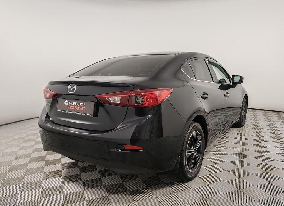 Mazda 3 1.6 AT (104 л.с.)