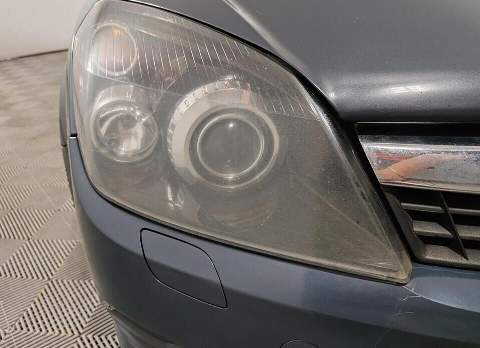 Opel Astra 1.8 AT (140 л.с.)