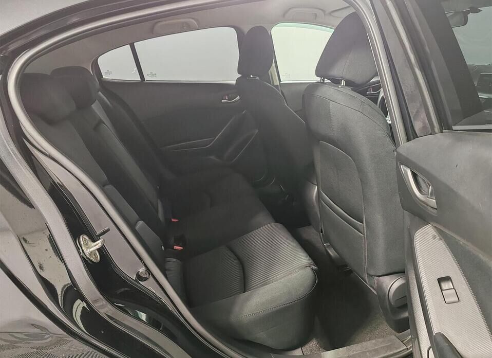 Mazda 3 1.6 AT (104 л.с.)