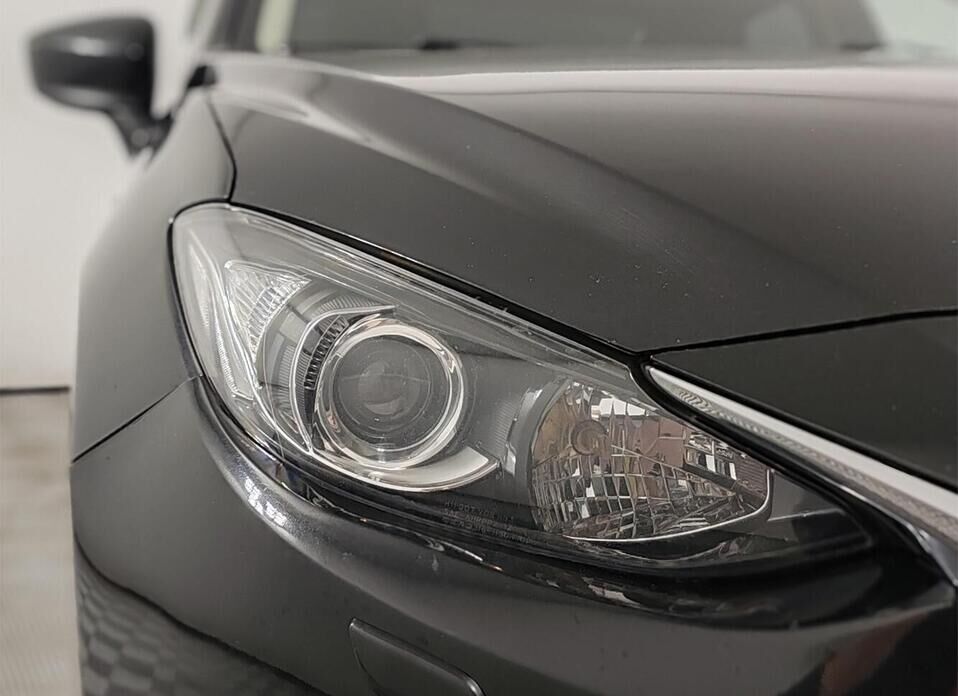 Mazda 3 1.6 AT (104 л.с.)