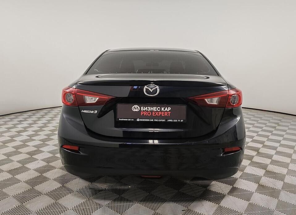 Mazda 3 1.6 AT (104 л.с.)