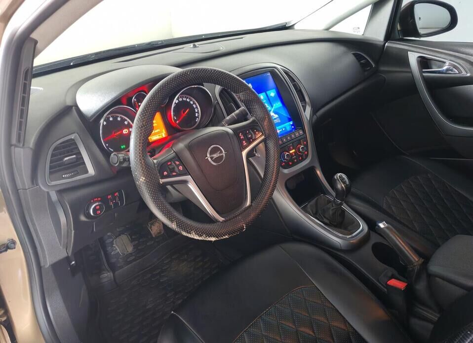 Opel Astra 1.6 MT (115 л.с.)