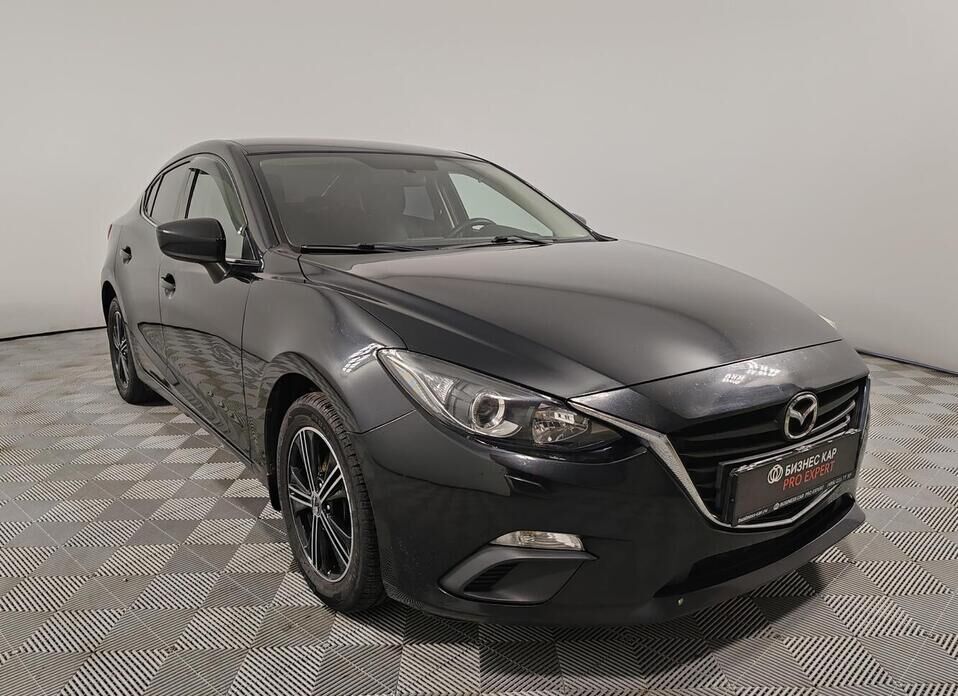 Mazda 3 1.6 AT (104 л.с.)