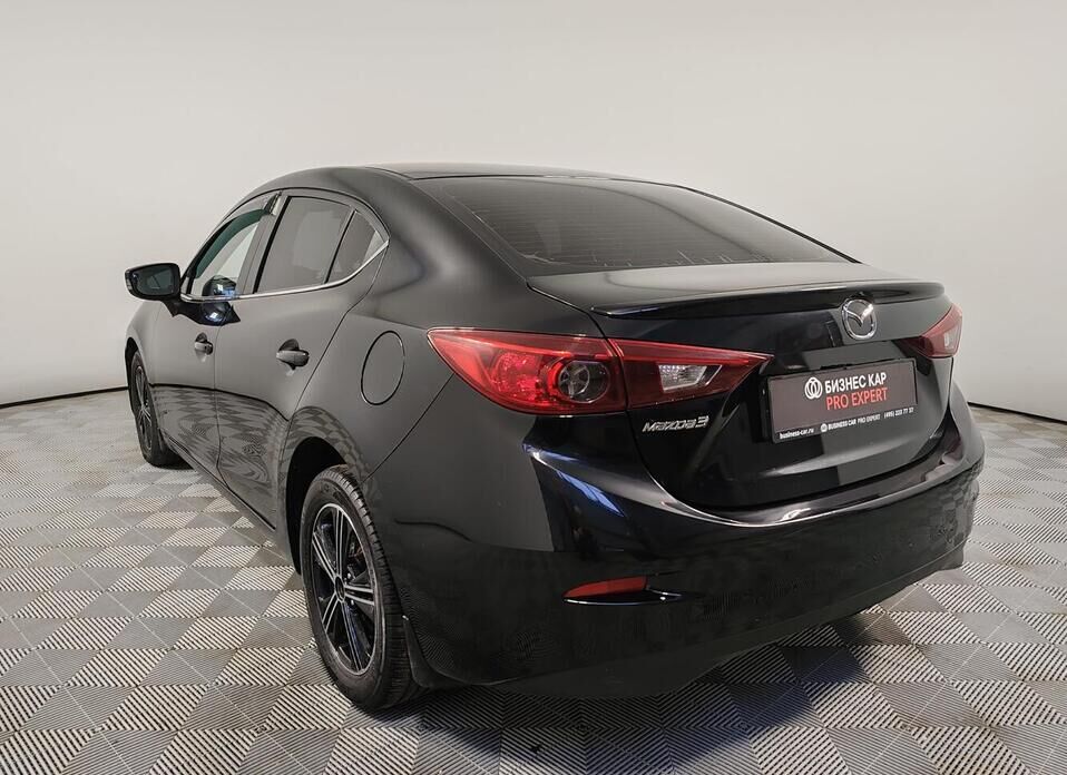 Mazda 3 1.6 AT (104 л.с.)