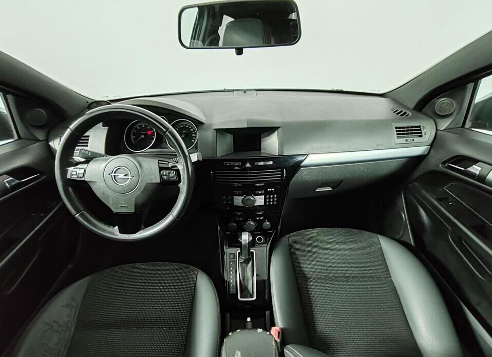 Opel Astra 1.8 AT (140 л.с.)