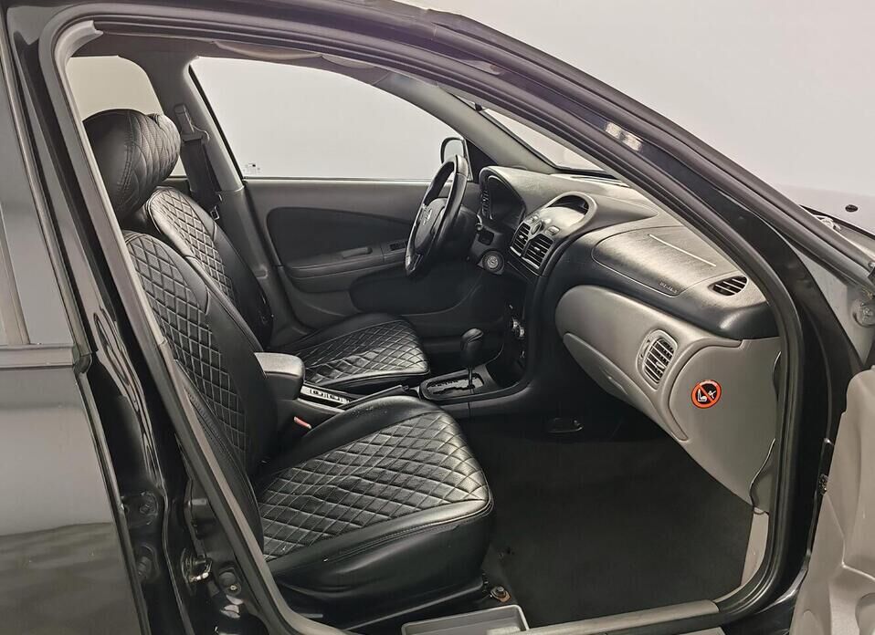 Nissan Almera Classic 1.6 AT (107 л.с.)