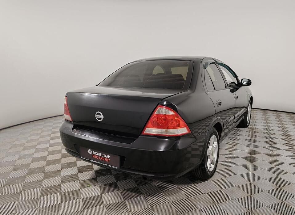 Nissan Almera Classic 1.6 AT (107 л.с.)