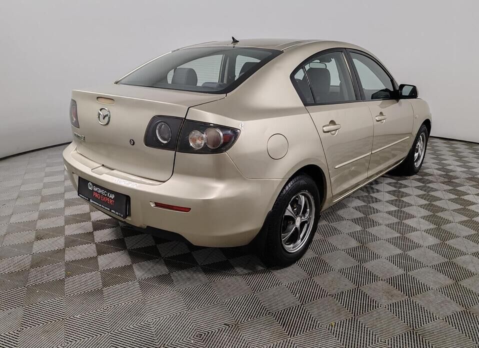 Mazda 3 1.6 AT (105 л.с.)