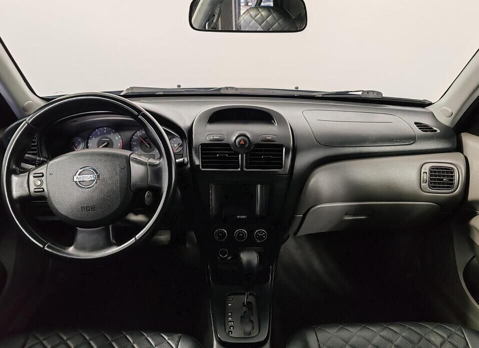 Nissan Almera Classic 1.6 AT (107 л.с.)