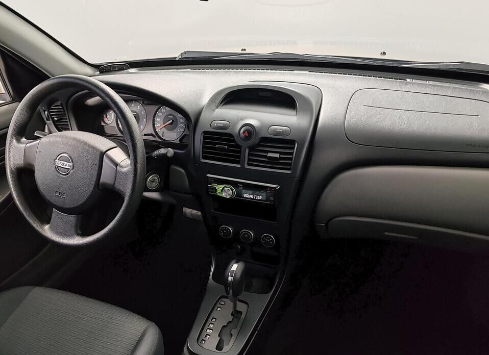 Nissan Almera Classic 1.6 AT (107 л.с.)